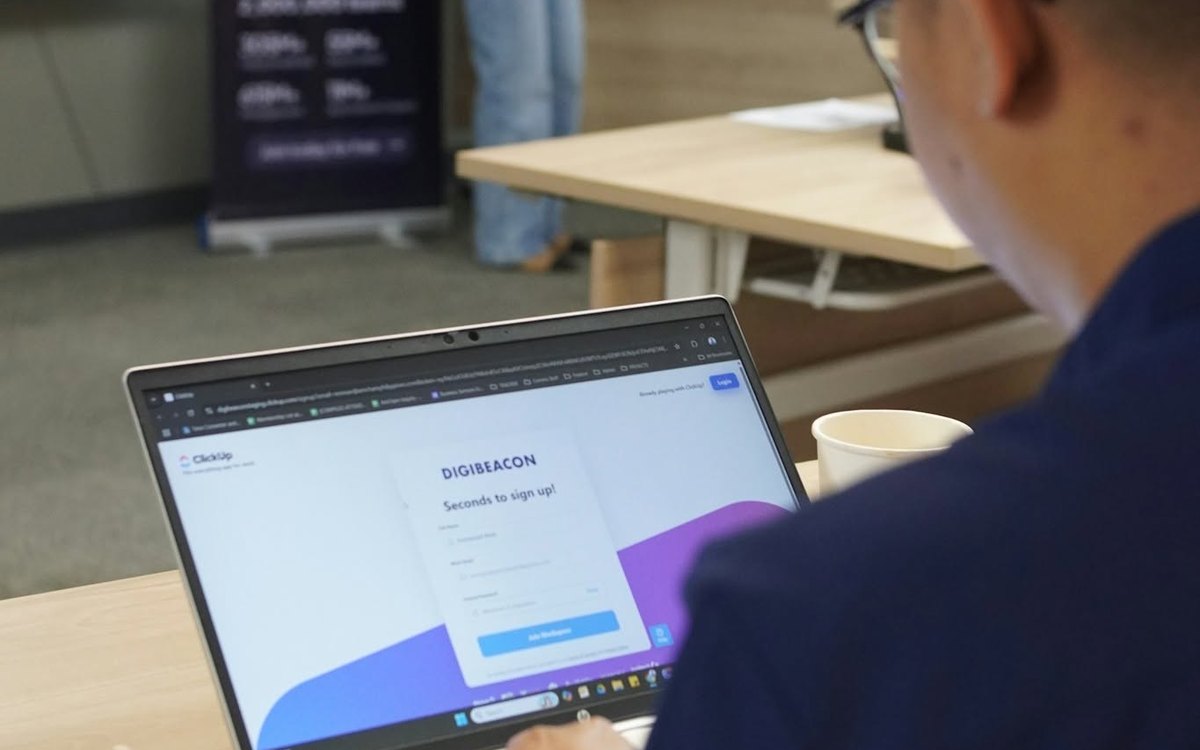 Attendee signing up for a Digibeacon ClickUp workspace during the AI project management series with AmCham